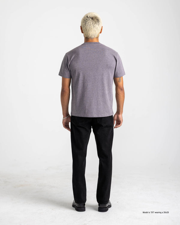 shorter guy in black rinse jeans