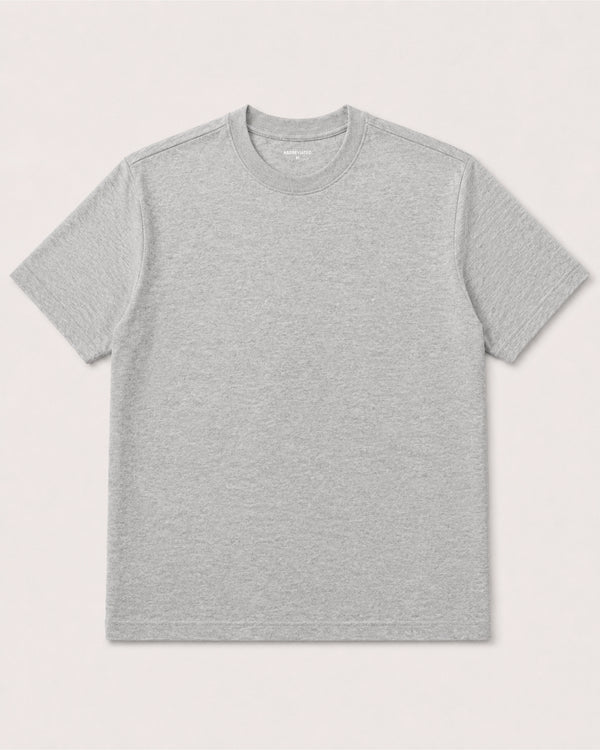 A light gray heather short-sleeve cropped crewneck t-shirt made for shorter guys laid flat against a light beige background.