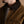 Load image into Gallery viewer, Close-up of a man wearing a brown corduroy jacket with a dark brown corduroy collar and a zippered chest pocket, layered over a white t-shirt.

