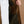 Load image into Gallery viewer, Close-up of a person wearing a brown jacket with a white shirt underneath, holding the jacket open to show the interior lining and a brown patch pocket.
