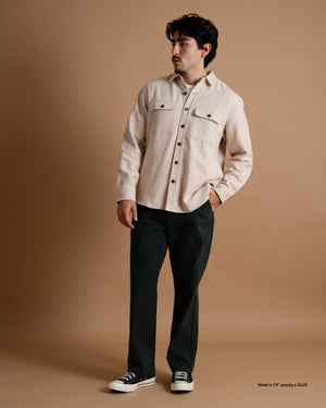 Model wearing loose chinos designed for shorter men