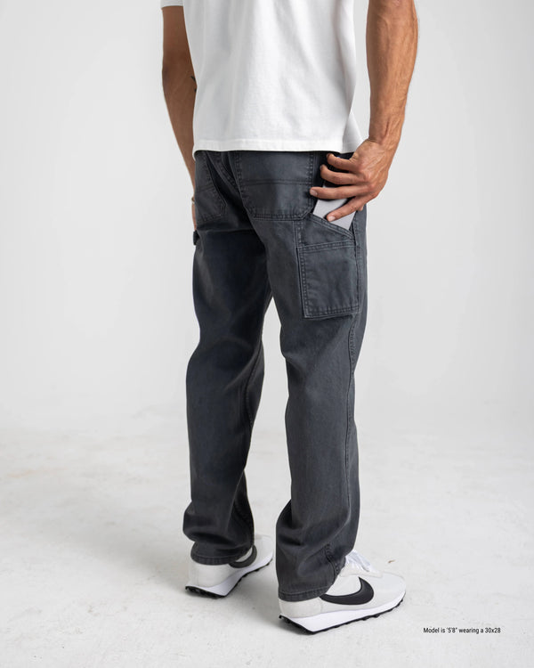 Short men's carpenter work pants detail