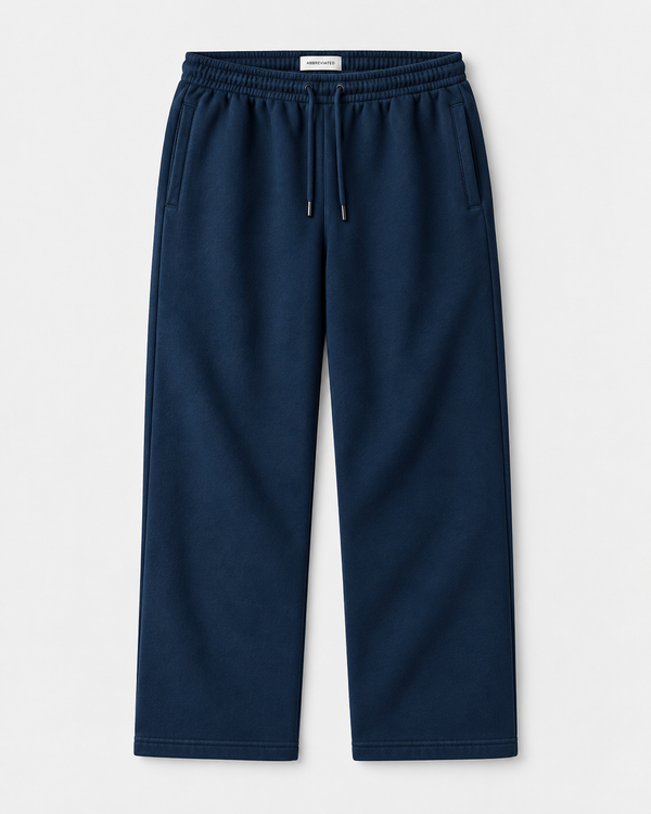A pair of navy blue sweatpants with an elastic waistband, drawstring, and side pockets, shown flat on a light gray background. Designed for shorter men.