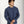 Load image into Gallery viewer, Man wearing a blue textured sweater against a white background
