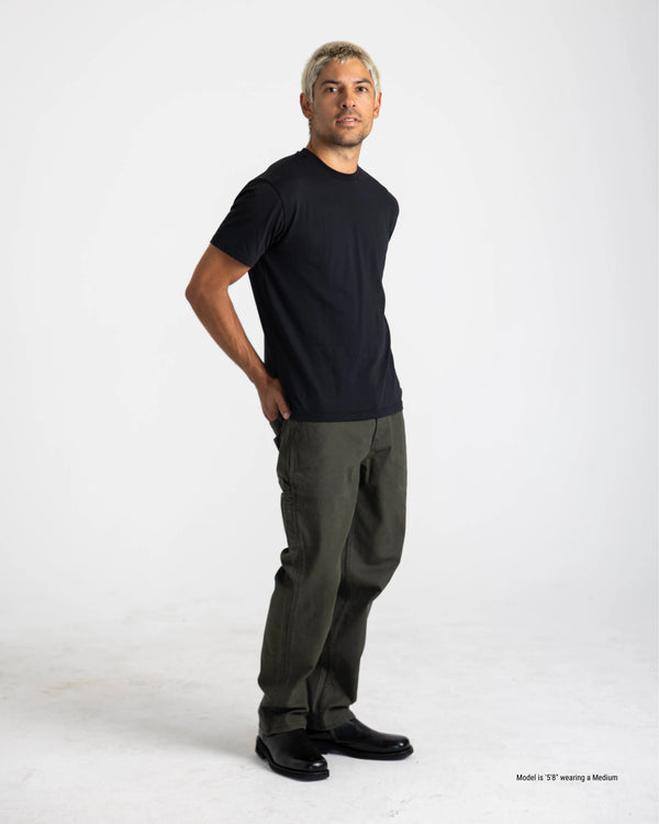 black t-shirt for shorter guys pose