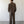 Load image into Gallery viewer, Man wearing a brown outfit standing against a plain white wall.
