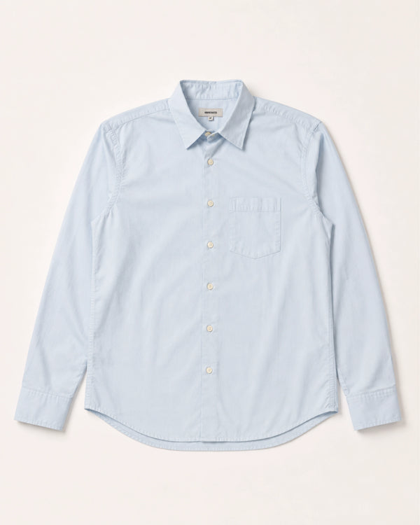 light blue button up shirt laid on white background