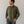 Load image into Gallery viewer, Short Man wearing an olive green shirt and blue jeans against a plain background
