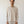 Load image into Gallery viewer, Man wearing a beige shirt and pants against a plain background
