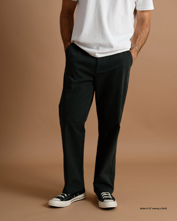 Closeup of a model wearing loose chinos designed for shorter men