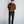 Load image into Gallery viewer, 5'8" man wearing black loose-fit pleated menswear trousers in a 30x28 with a brown crewneck sweater and loafers
