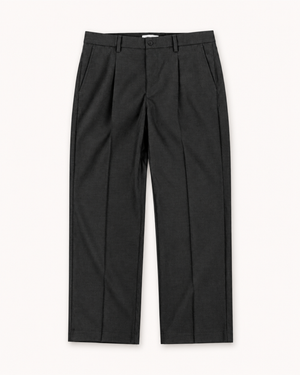 Black loose pleated trousers styled with a white t-shirt and black belt on a 5'8" man, full-length front view