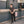 Load image into Gallery viewer, 5'4" Man leaning against a wall with a 'No Parking' sign in the background
