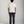 Load image into Gallery viewer, Person wearing a white t-shirt and dark pants on a plain background
