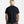 Load image into Gallery viewer, Person wearing a black t-shirt on a plain background

