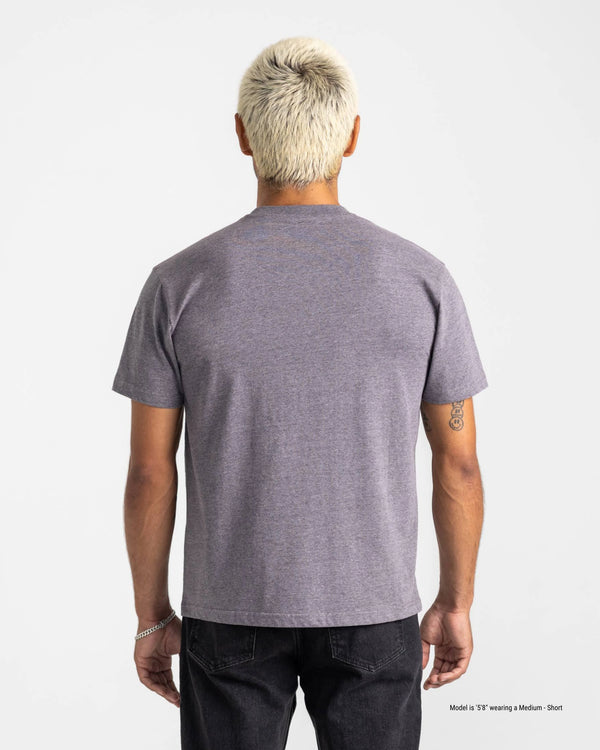 Person wearing a gray t-shirt on a white background