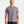 Load image into Gallery viewer, Man wearing a plain gray t-shirt against a white background
