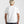 Load image into Gallery viewer, Person wearing a plain white t-shirt on a light gray background
