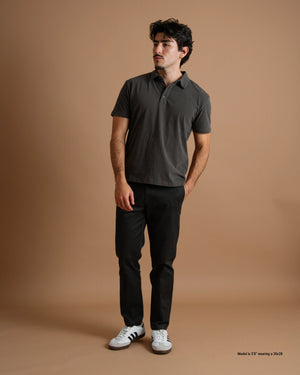 Model Wearing Slim Black Chinos For Shorter Men
