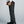 Load image into Gallery viewer, Side profile of charcoal straight menswear trousers proportioned for shorter men, worn with loafers
