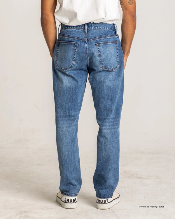 straight fit jeans for short men dark medium wash close  back