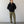 Load image into Gallery viewer, Shorter Man wearing a black jacket and green pants standing against a plain white wall.
